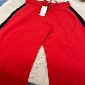 Tommy Hilfiger and Gigi Hadid Collab red heavyweight sweatpants with black side